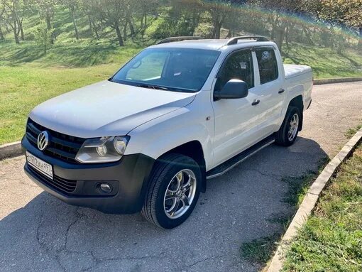0 td. Volkswagen amarok 2013 белый. Фольксваген амарок пикап коричневый механика. Volkswagen amarok 2010 — 2016 i белый. Фольксваген амарок пикап белый.