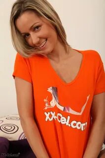 Lovely amateur babe Nancy Blond squeezes milk out of her big perky tits.