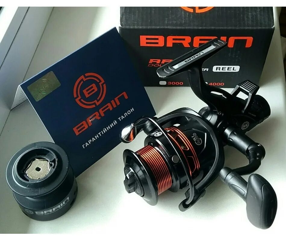 Brain apex. Катушка Брайан Апекс 5000. Катушка Brain Apex Double Baitrunner 21 5000 Screw Handle 6+1bb 5.1:1. Катушка Brain 6000 байтранер. Катушка Brain карповая.