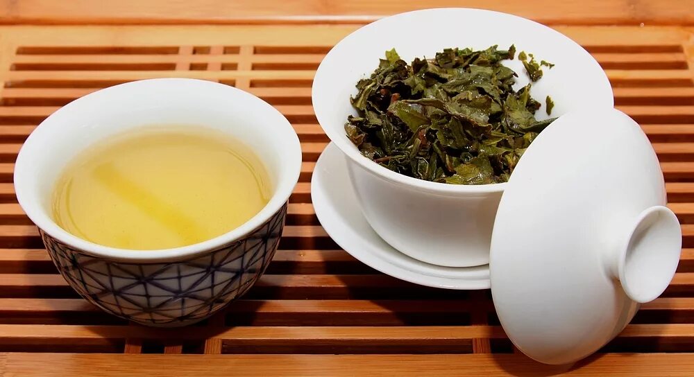 Улун чай польза для женщин. Тегуаньинь Аньси. Чай улун Тегуаньинь. Чай "те Гуань Инь ". Улун те Гуань Инь.