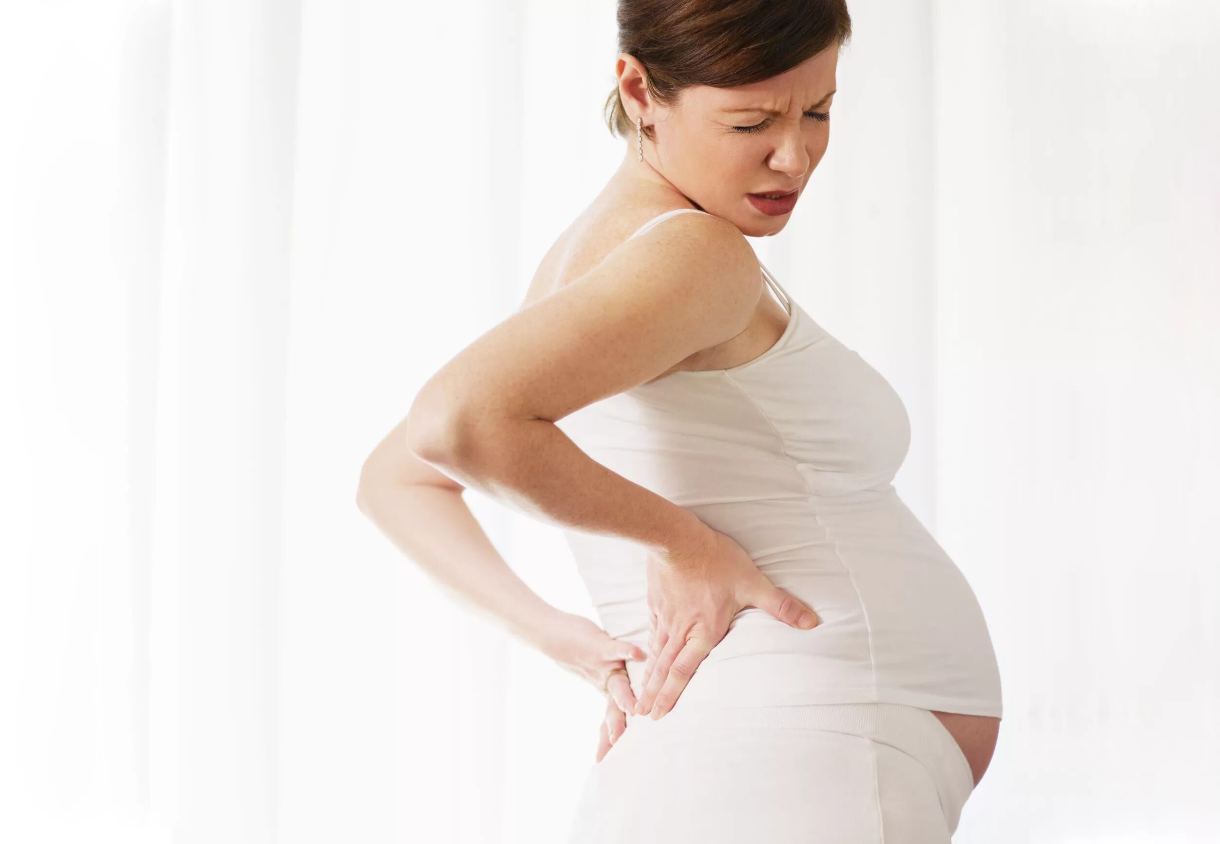 Схватки спиной. Беременность. Беременной женщины. Заболевания беременных. Пиелонефрит у беременных.