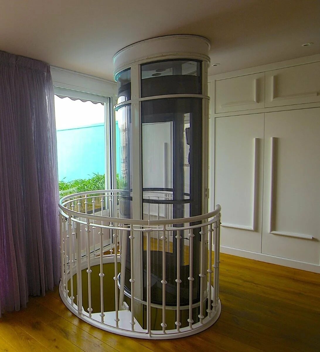 Компактный лифт для коттеджа. Лифты для частных домов. Гидравлический лифт для коттеджа. Подъемник лифт на 2 этаж. Вертикальный подъемник втпм 4000.