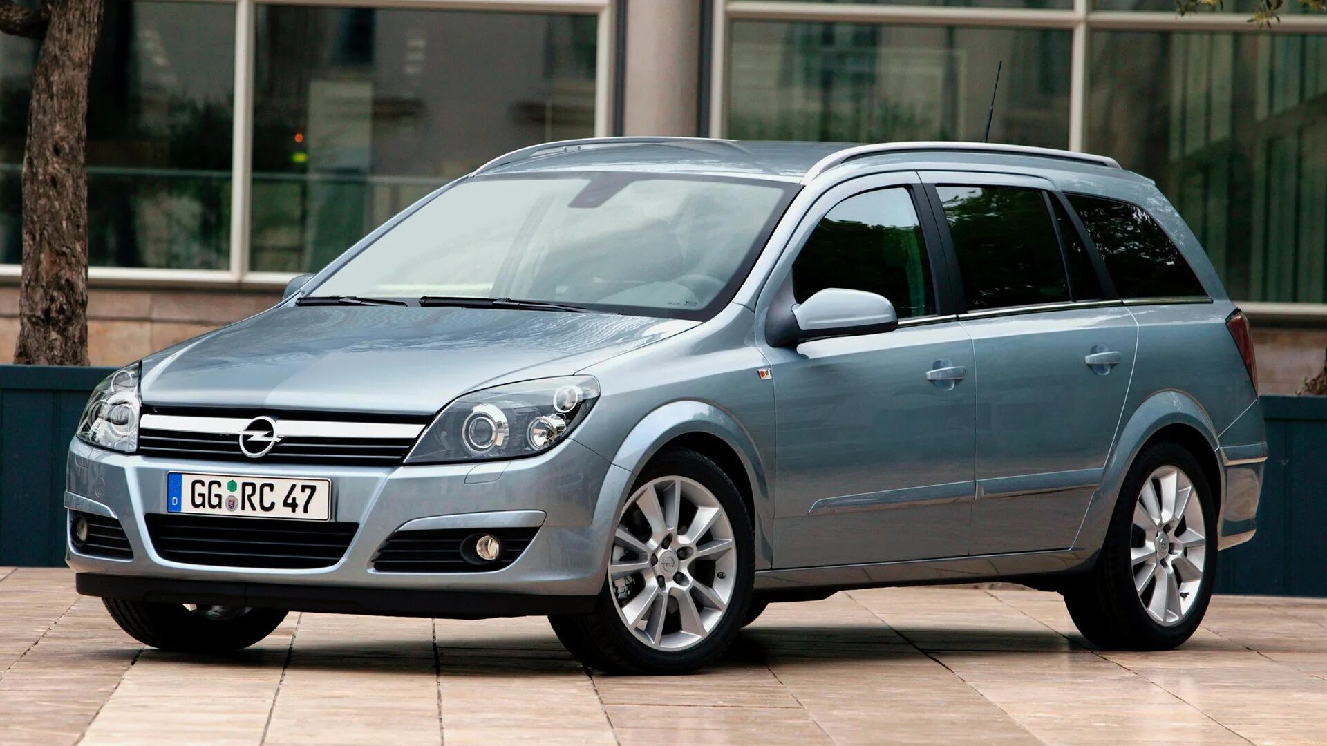 Opel Astra Caravan 2007. Opel Astra Station Wagon (a-h/SW) 2011.