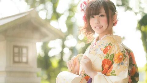 Download Japan Girl Orange Floral Kimono Wallpaper | Wallpapers.com.