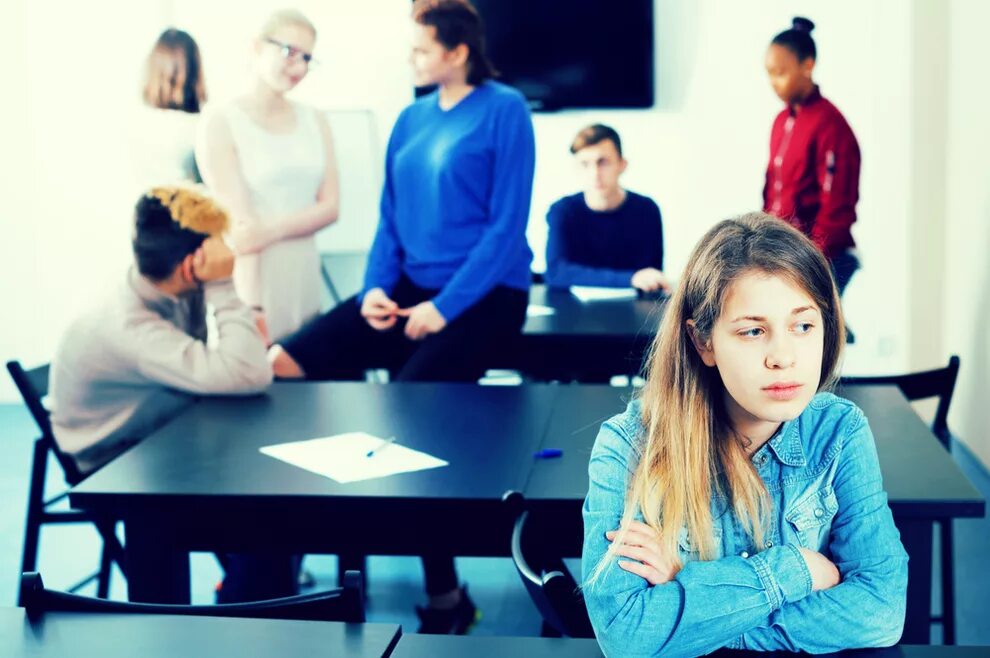 Shy student. Логофобия фото. Studies between classmates.