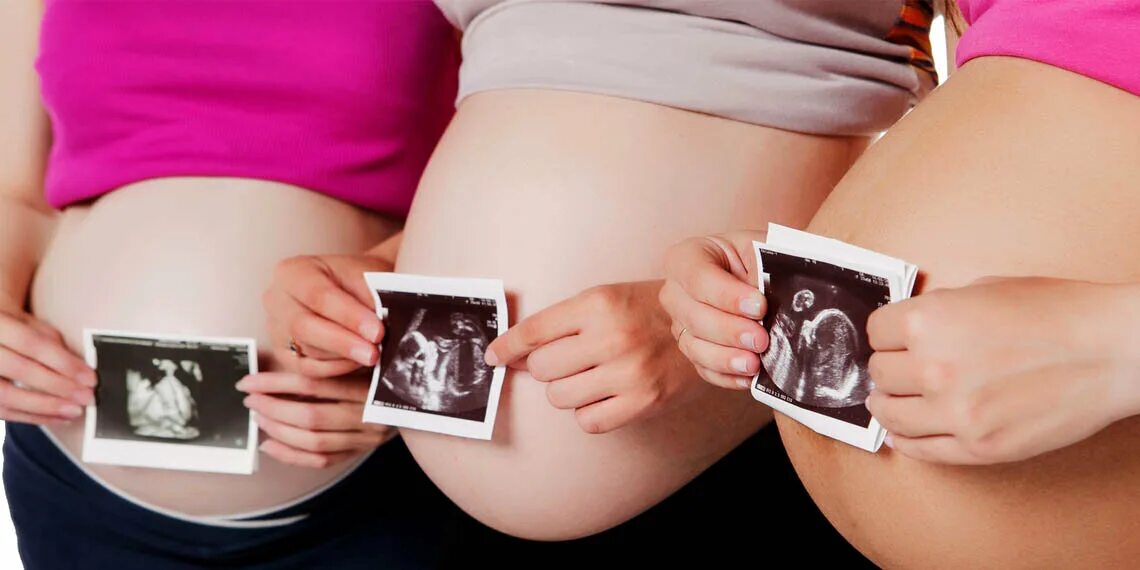 Вторая беременность девочкой. Фото беременности. Несколько беременных женщин. Фотосессия беременной мальчико.