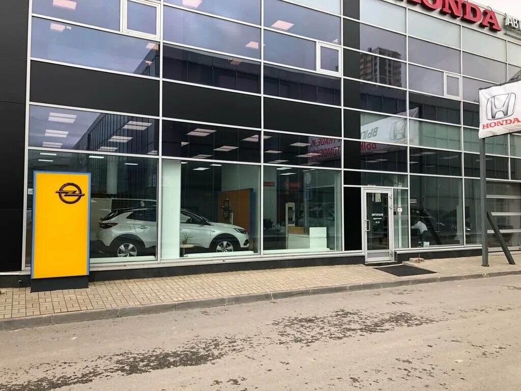 Opel петербург. Автополе в Кудрово СПБ. Дилерский центр Opel. Автополе Дыбенко. Автосалон Кудрово.