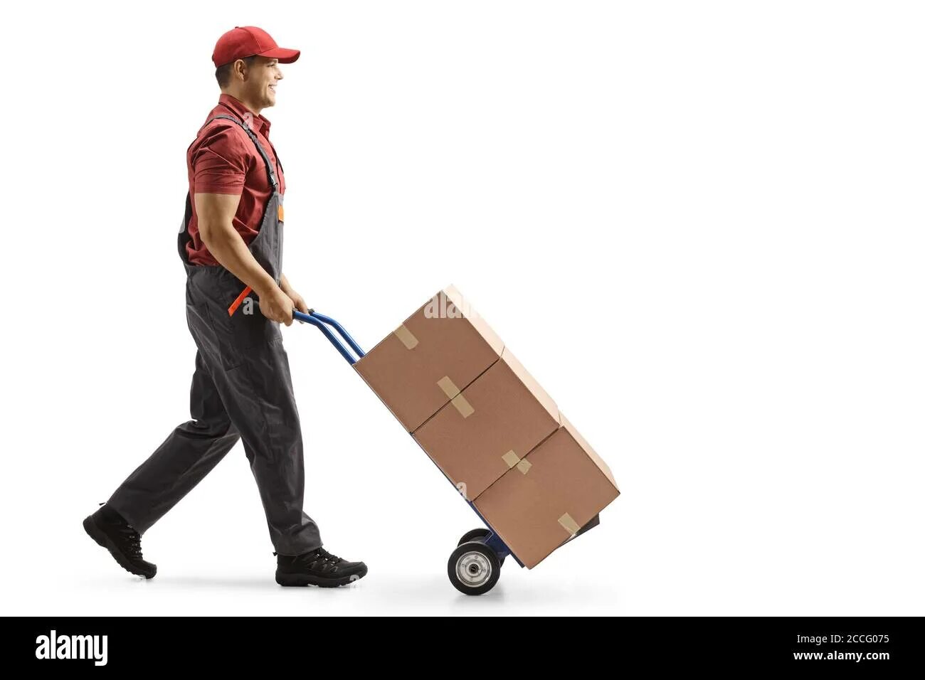 Moving people. A man pushing a Box on the Road. A man carrying a load.