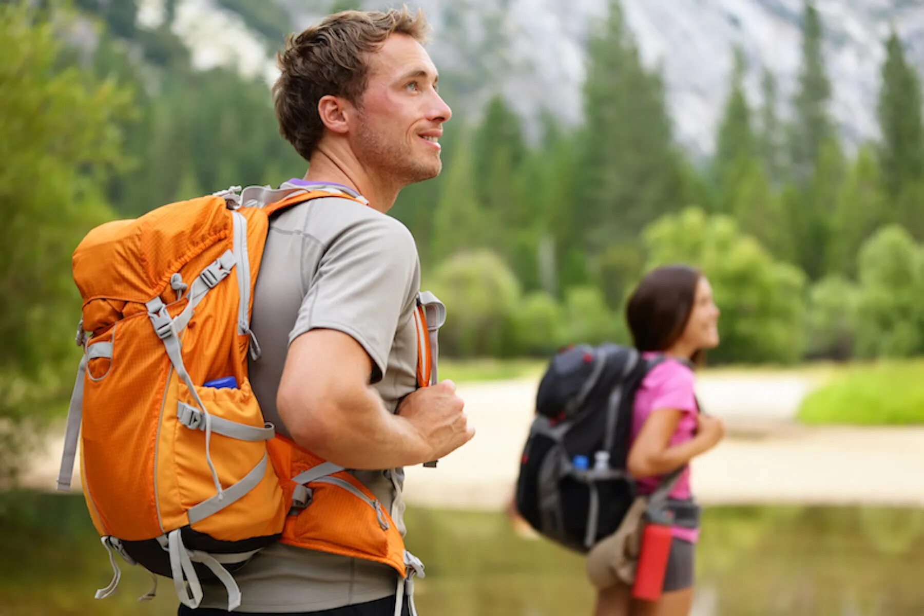 When most people travel. Треккинг хайкинг. Турист с рюкзаком. Человек с рюкзаком. Мужчина с рюкзаком.