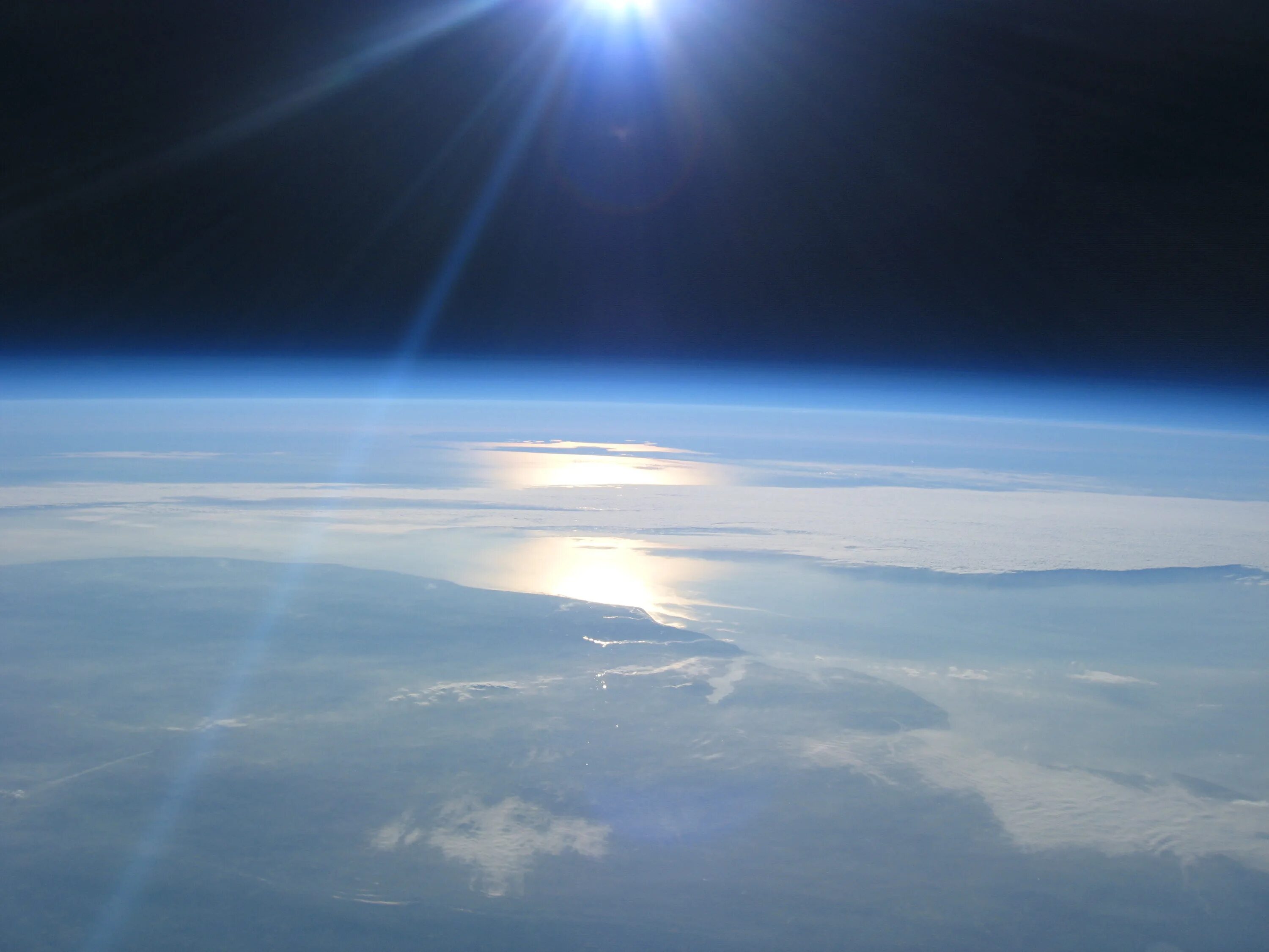 Стратосфера арпарт. Облака из космоса. Вид с самолета на землю. Земля из стратосферы. Земля из стратосферы.