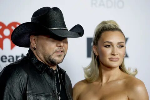 The wife of country singer Jason Aldean defended her recent comments that m...