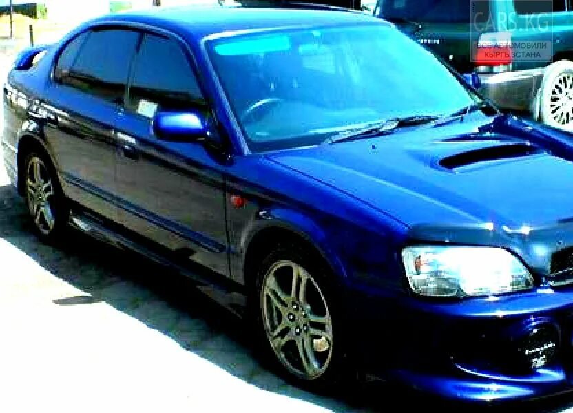 Subaru legacy 2003. Субару б4 2003г. Субару б4 синий. Синий Субару б4 2004г.