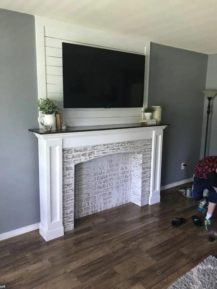 Custom Cabinet with a regular Electric Fireplace. Private Residence Toronto. Fir