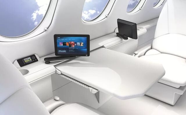 Столик в самолете. Nextant 400xt. Откидной столик в самолете. Складной столик в самолете.
