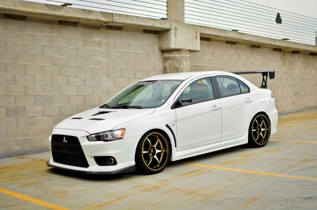 Mitsubishi evo x. Mitsubishi Lancer Evolution 10. Мутсубиси Лансер Эво 10. Митсубиши Лансер эко 10. Mitsubishi Lancer EVO X.