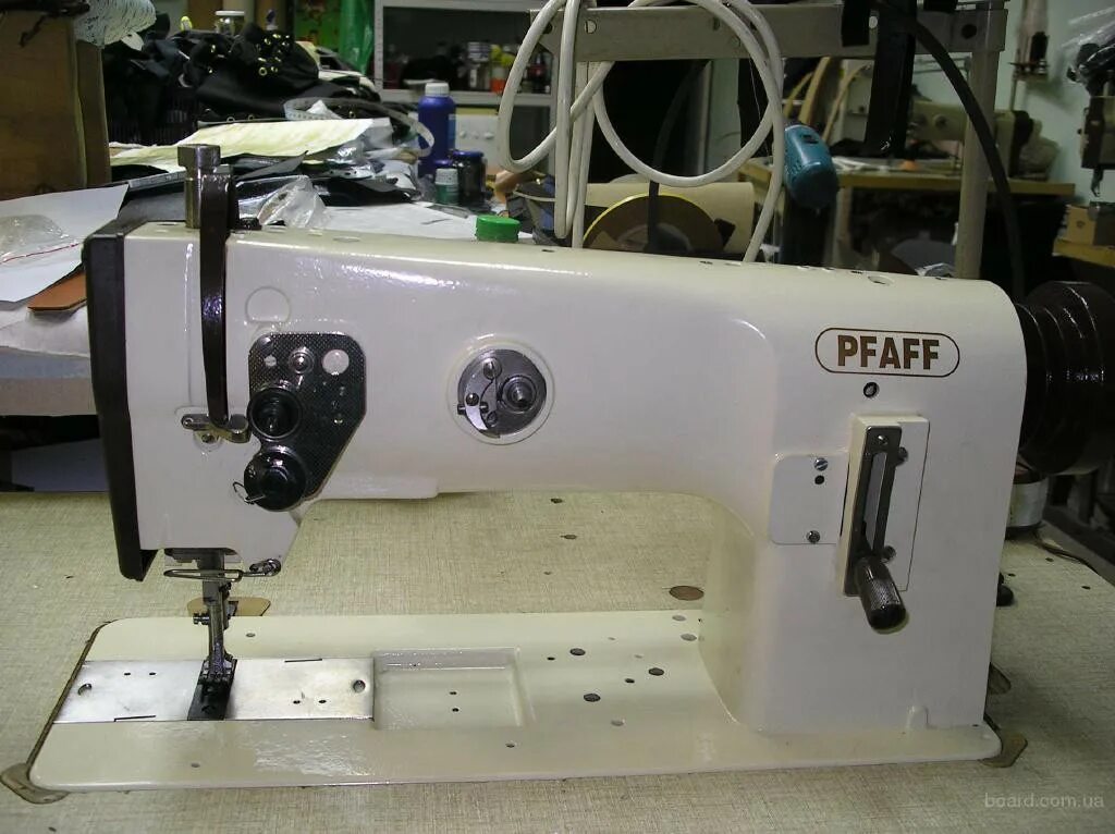 Швейные машинки ульяновск. Швейная машинка Пфафф 1245. Промышленная швейная машина Pfaff. Pfaff промышленные Швейные. Pfaff 4850.