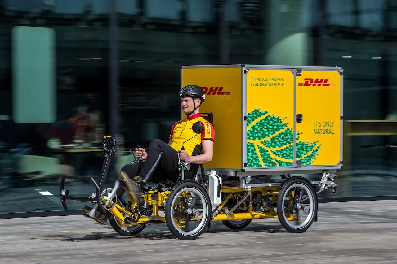 Доставить велосипед. Карго байк грузовой велосипед. карго байк dhl. доставка на велосипеде. необычные грузовые велосипеды.