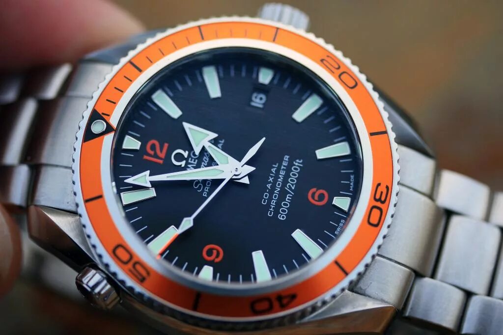 Planet ocean. Omega seamaster planet ocean orange. omega seamaster оранжевые. оранжевая omega 8500 seamaster. omega seamaster planet ocean 600m 42mm каучук.