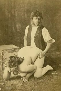 Unknown photographer, France 'Clothed man kneeling behind a nude woman...