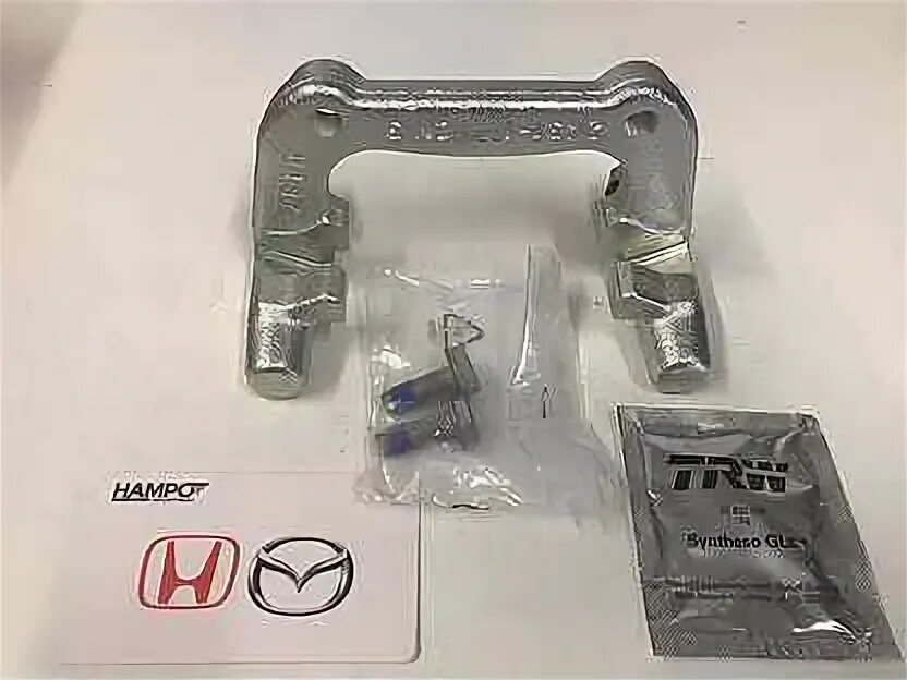 Скоба переднего суппорта honda accord 7. Скоба переднего суппорта honda accord 7. Скоба суппорта хонда аккорд 5. Скоба переднего суппорта honda accord 7. Хонда аккорд 8 скоба переднего суппорта артикул.