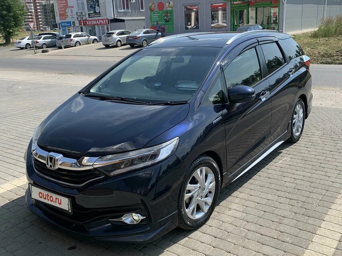 хонда фит шаттл 2015. робот honda shuttle. синий honda shuttle 2015. робот honda shuttle. Honda fit shuttle hybrid 2017.