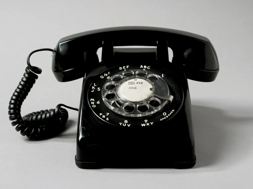 Домашний телефон. Старый телефон. Офисный телефонный аппарат. Домашний телефон стационарный.