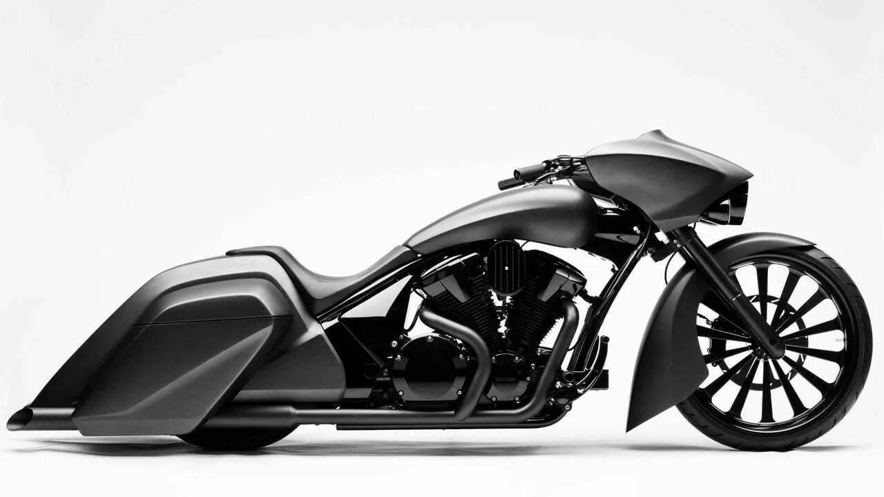 Экономичные мотоциклы. Мотоцикл кастом бэггер. honda vt 1300 stateline. мотоцикл honda bagger. мотоциклы harley-davidson bagger.