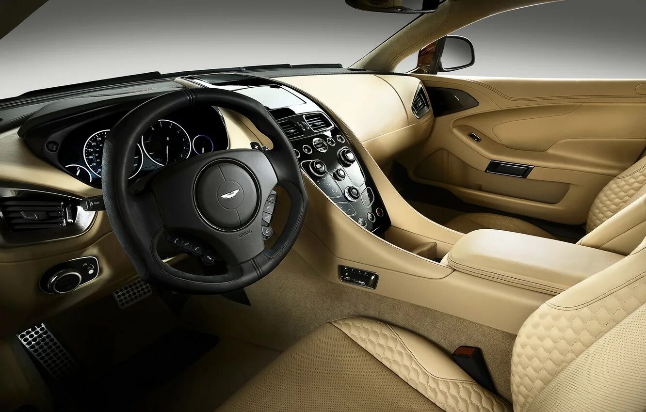 Фото салон внутри. Астон Мартин салон. Aston Martin Vanquish 2012 салон. Автомобиль Астин Мартин салон.