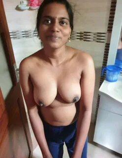 Indian housewife nude in kitchen. 