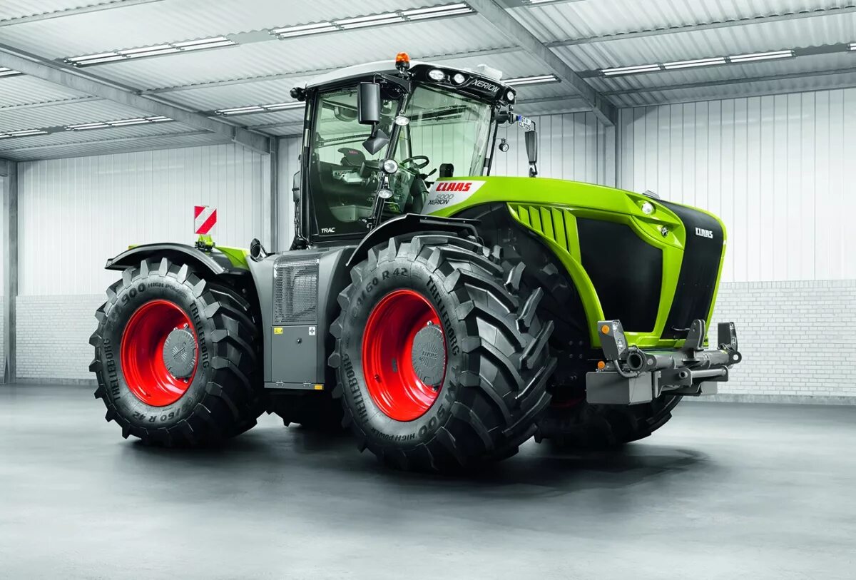 Claas xerion. Трактор claas xerion 4000. трактор класс херион 5000. трактор клаас ксерион 5000. трактор xerion 4000-5000.
