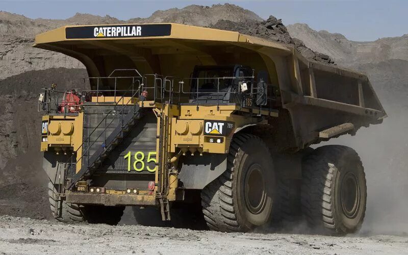 Самосвалы caterpillar 777f. Caterpillar 770. Caterpillar 798 ac. Сат 785с. Горные самосвалы катерпиллер.
