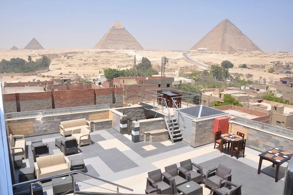 Аль каир пирамидс. Аль каир пирамидс. Tuya pyramids inn hotel. Сан сити эль дабаа египет. Плато гиза египет.
