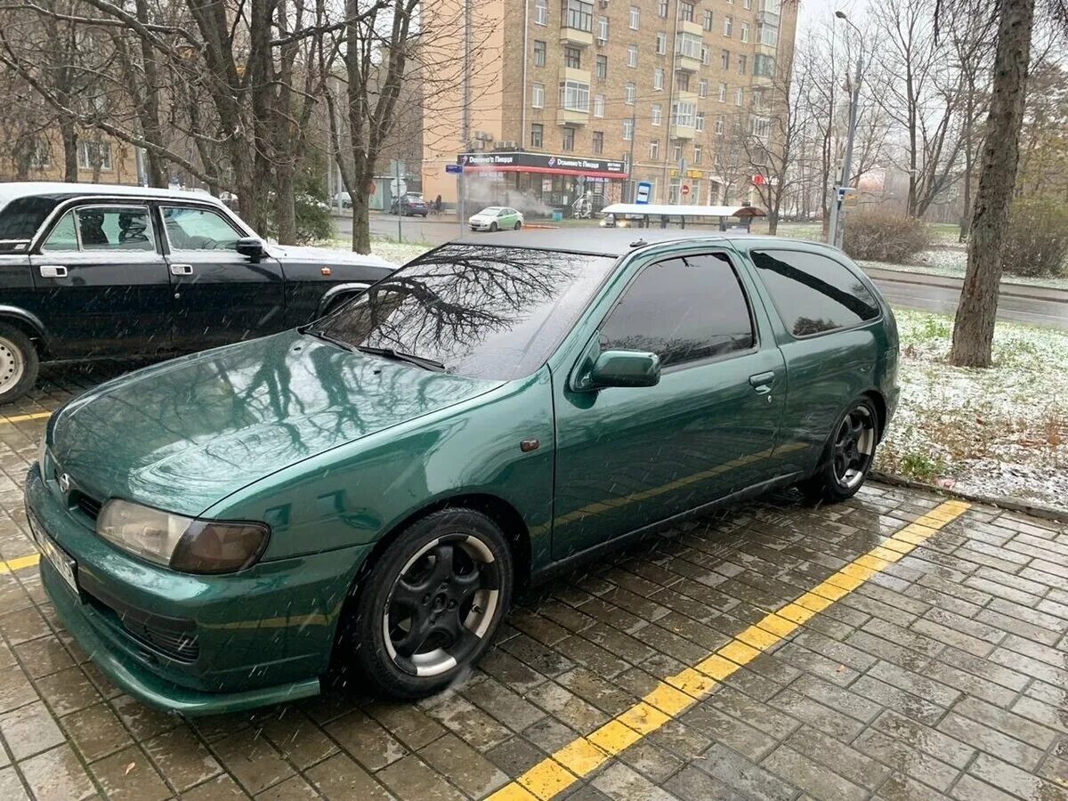 Nissan Almera 1997. Ниссан Альмера н15 зеленый. Ниссан Альмера 1997 года.