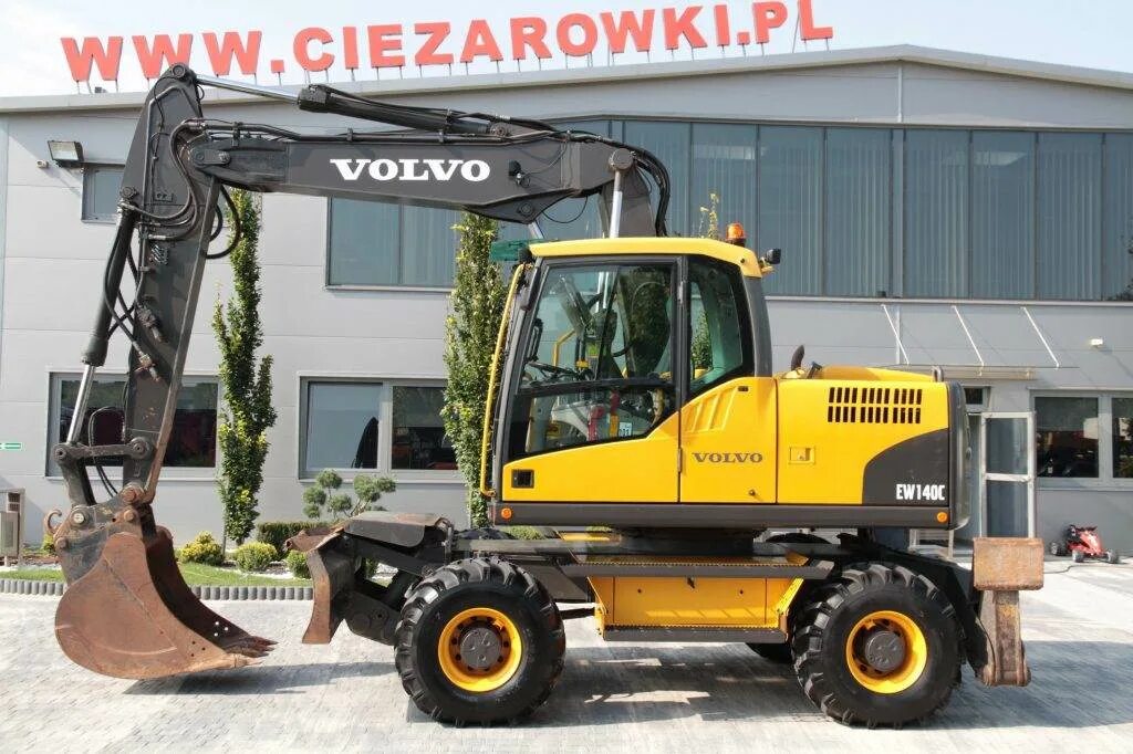 Volvo ew140. Экскаватор колесный Volvo ew140d. Вольво 140 экскаватор колесный. Volvo ew140 колесный экскаватор. Колесный экскаватор вольво