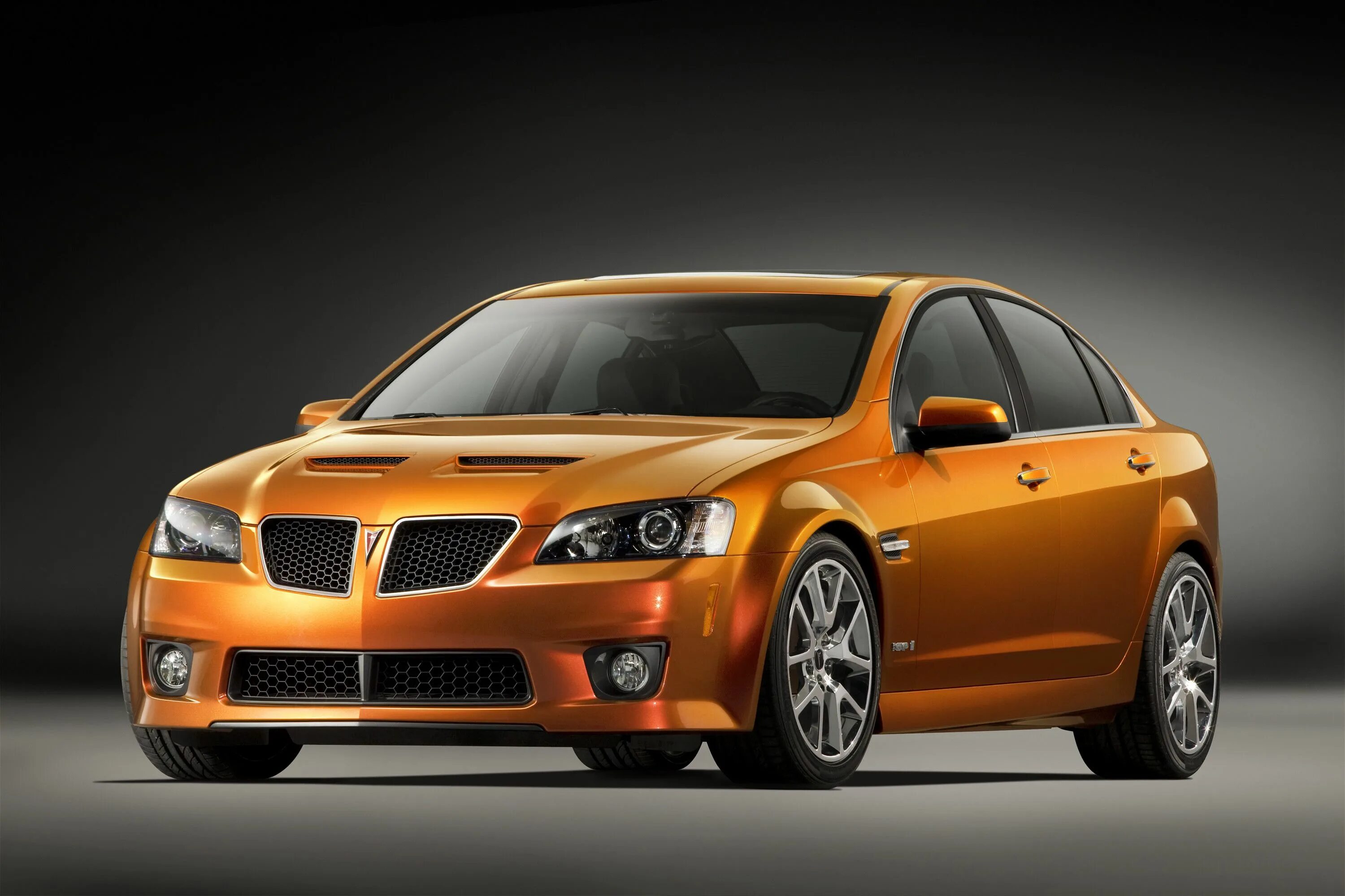 Иномарка сторе. Понтиак g8. Pontiac g8 GXP. Шкода Понтиак. Понтиак оранжевый.