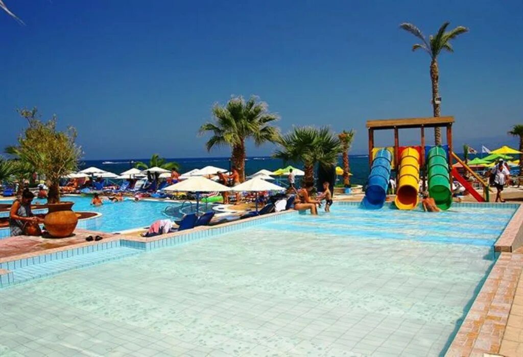 Beach hotel village. Eri Beach Village Hotel 4. Эри Бич отель Крит 4. Eri Beach Hotel Крит. Eri Beach Village Hotel 4 Крит.