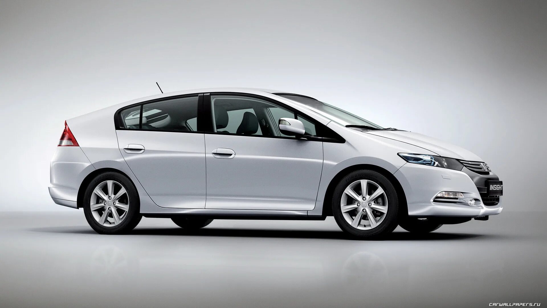 Размеры хонды инсайт. Honda Insight 2012 синяя. Honda Insight 2022 Grey. Хонда Инсайт фара. Реснички на фары Хонда Инсайт.