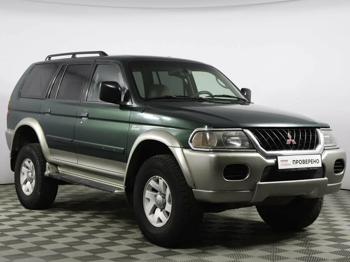 Бензиновые mitsubishi pajero. Митсубиси Монтеро спорт. Мицубиси Монтеро спорт 1. Мицубиси Паджеро Монтеро спорт. Mitsubishi Pajero Montero Sport 1.