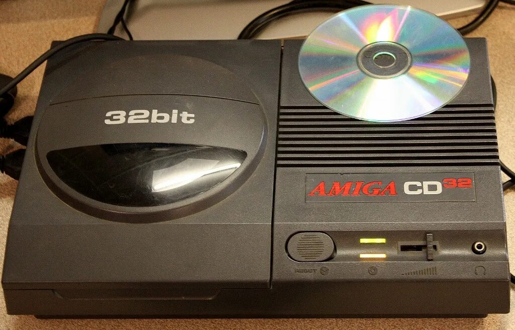 Commodore amiga cd32. Commodore amiga cd32 игры. Commodore amiga cd32 logo. Cd32 тенвыды.