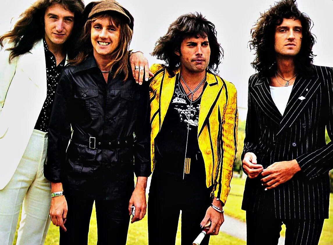 Слушать песни queen. Группа Квин. Квин 1975. Группа куин Богемская рапсодия. Группа Queen 1975.