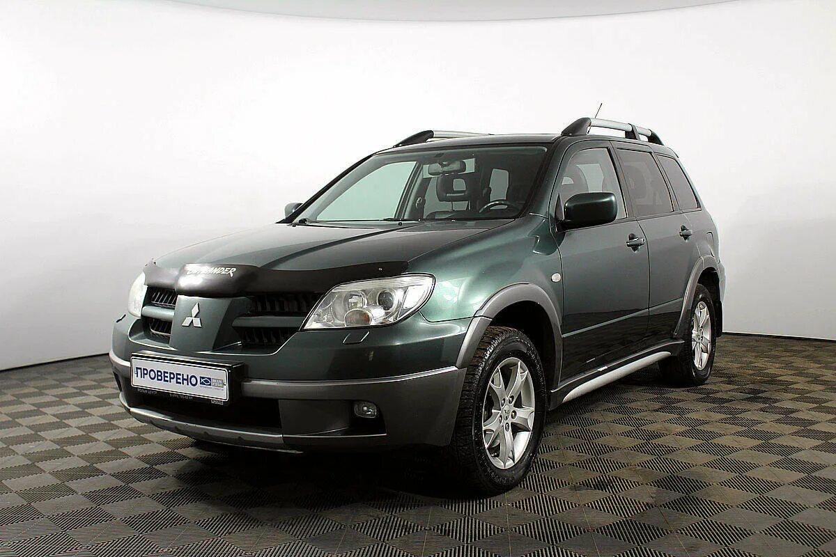 Mitsubishi outlander первое поколение. Аутлендер 2006 2.4. Mitsubishi Outlander 2006. Mitsubishi Outlander 1. Аутлендер 1 поколения.