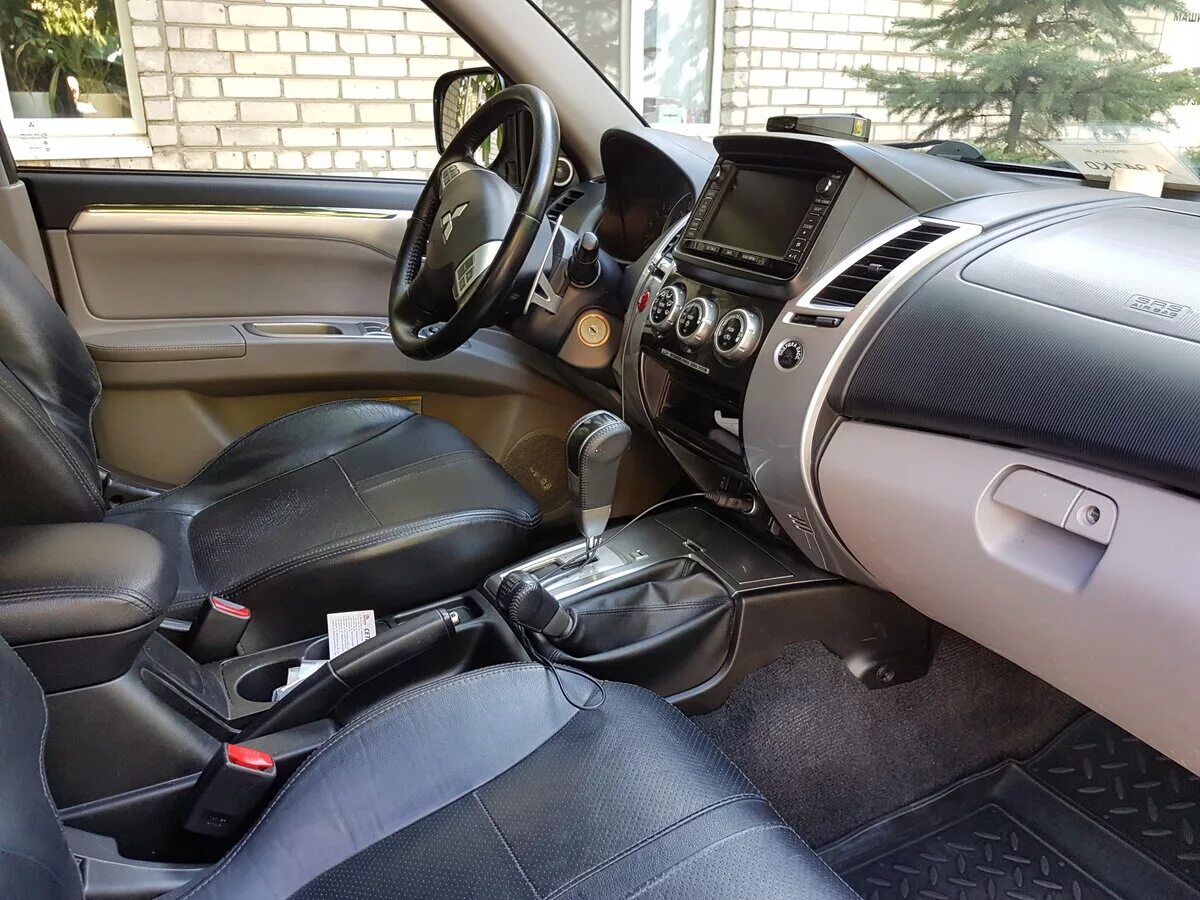 митсубиси паджеро спорт 2013. Mitsubishi pajero sport 2 салон. митсубиси паджеро спорт 2014 салон. салон паджеро спорт 2. салон паджеро спорт 2.