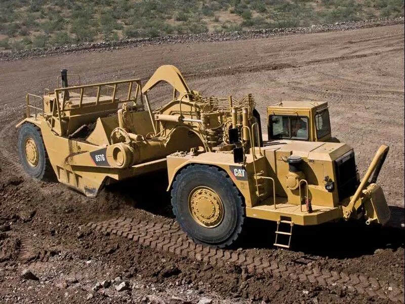 Скрепер Caterpillar 637f. Скрепер Caterpillar 60. Трактор Caterpillar Scraper 1972. Cat 651е скрепер. Скрейпер