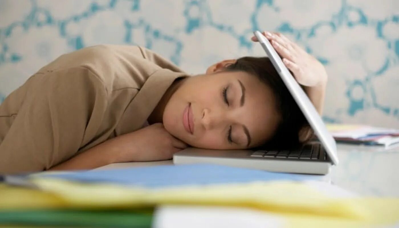 She is sleepy. She is sleeping. a person who is sleeping.
