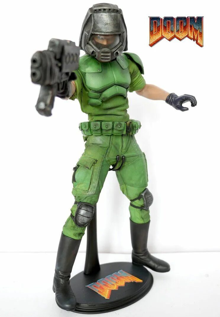Custom doom. Doom игрушка doomguy. doomguy фигурка. дум фигурка думгай. doom marine игрушка.