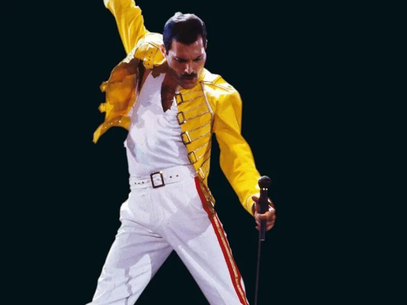 Freddie mercury интервью 1977. Группа квин фредди. Фредди меркьюри на сцене. Песни фредди меркури чемпион. Freddie mercury live aid.