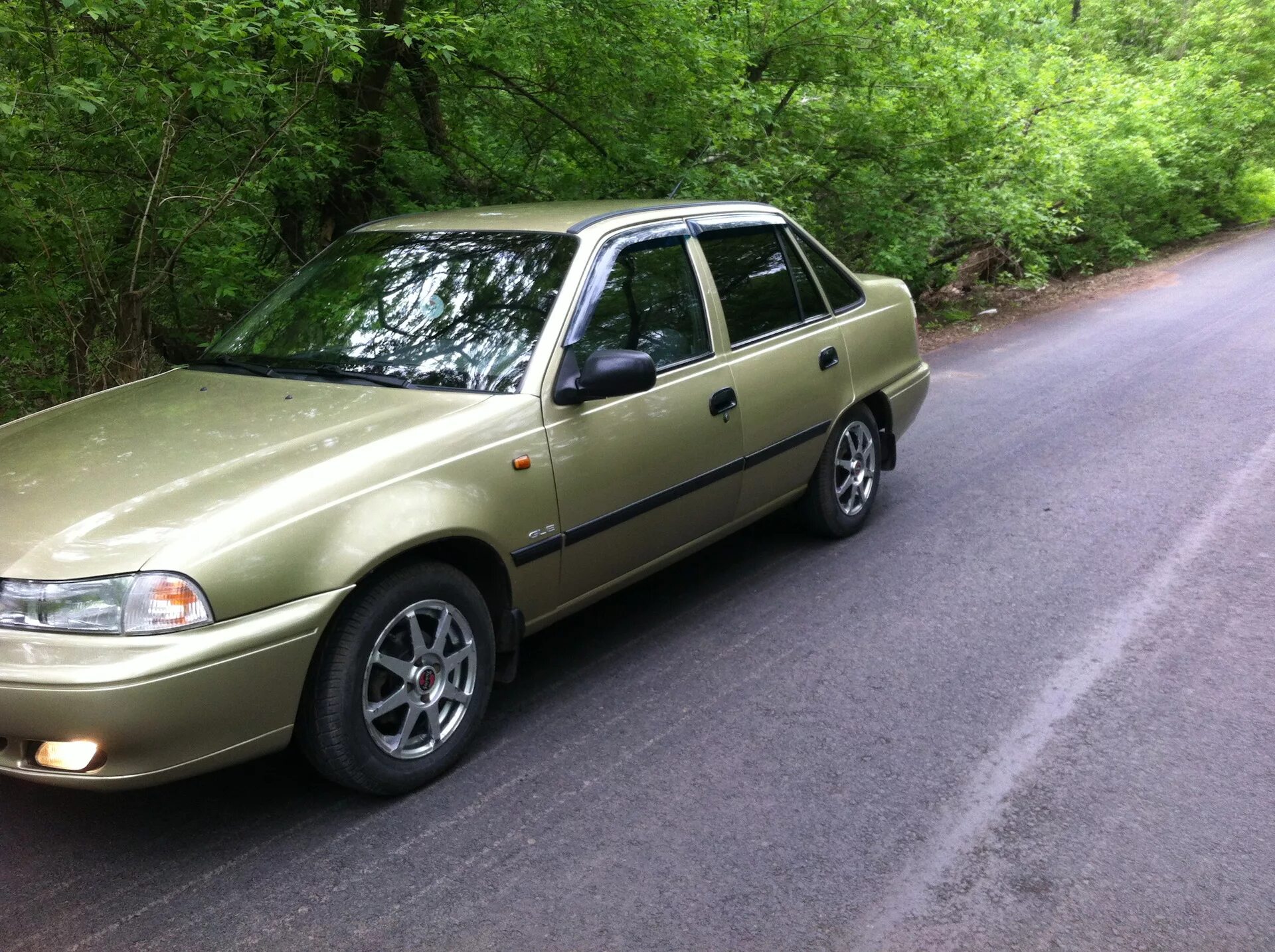 Диск нексия 14. Daewoo nexia r15. диски дэу нексия r14. дэу нексия на дисках. дэу нексия на литье 15.