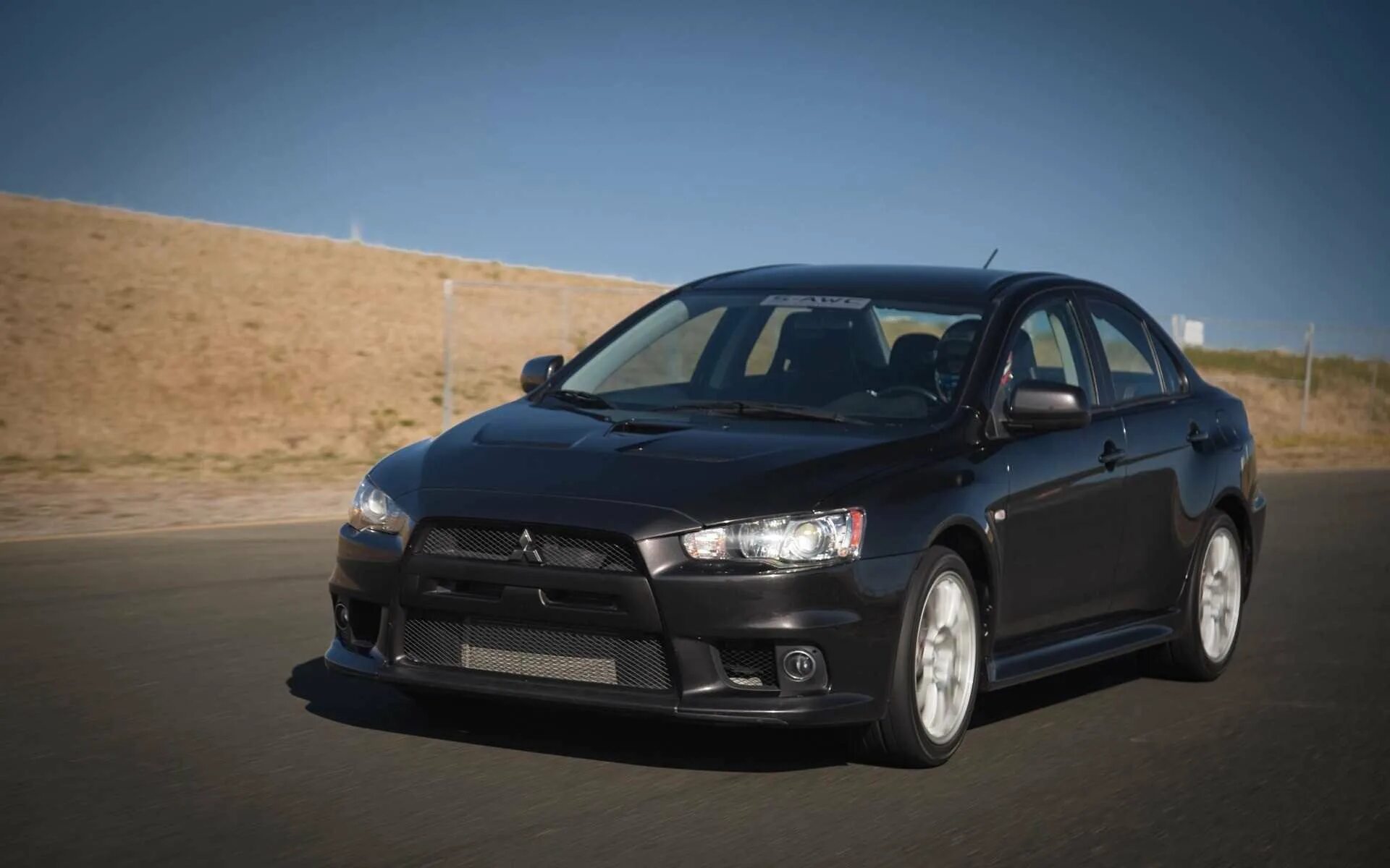 Mitsubishi lancer 10 поколения. Митсубиси Лансер 10. Lancer Evolution 10. Mitsubishi Lancer 12. Мицубиси Лансер 2010.