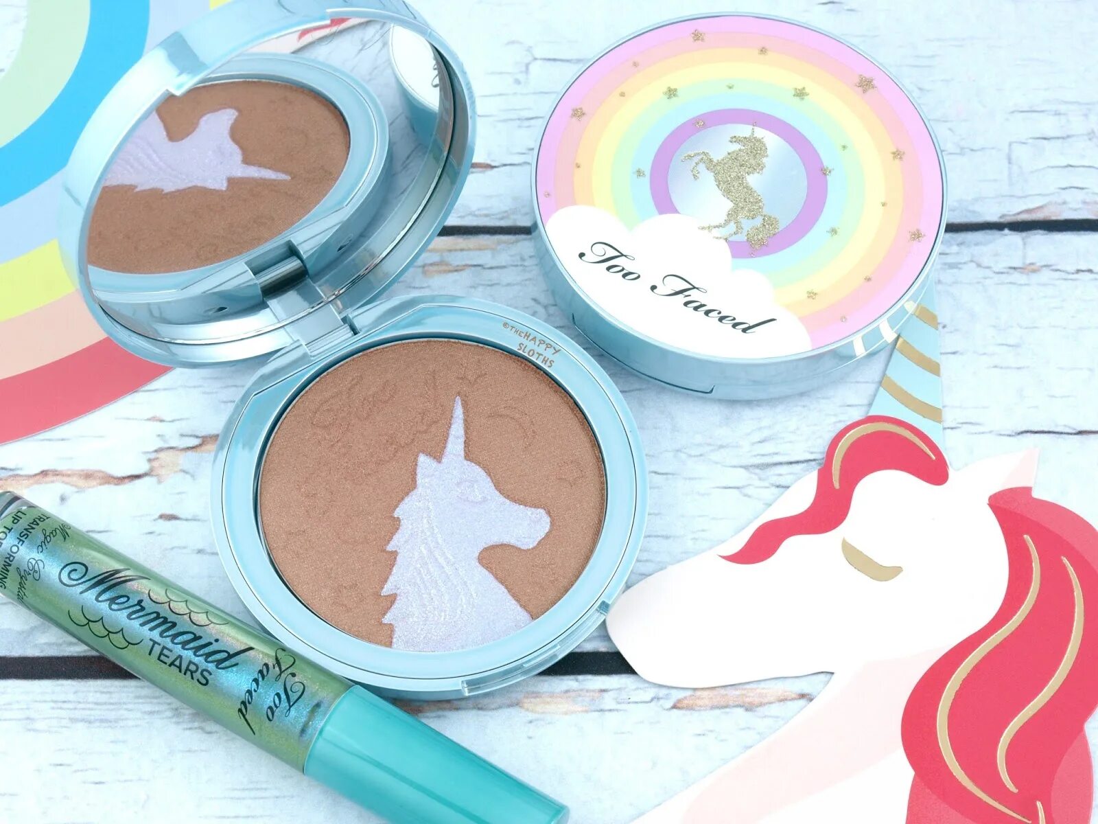 To faced life is. Too faced тени Unicorn. Хайлайтер Единорог. Бронзер too faced Unicorn tears Holographic. Too faced Единорог.