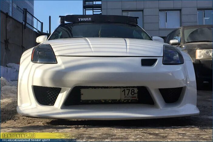 Покрасить обвес. Ниссан 350z в обвесе. nissan 350z обвес акула. nissan 400z обвесы. nissan 400z veilside.